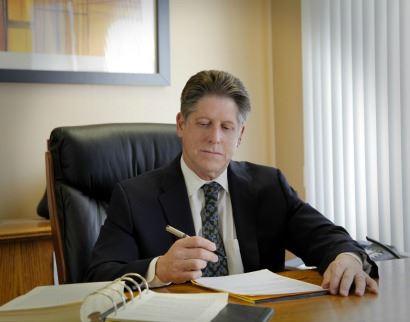 Attorney Richard Ross at his desk