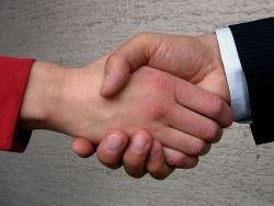 two people shaking hands